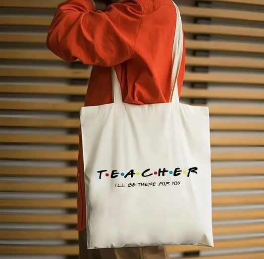 Teacher Öğretmenler tasarımlı %100 pamuk ham bez çanta. 35x40 cm dayanıklı, çevre dostu, günlük kullanım ve hediye için ideal tote bag modeli.