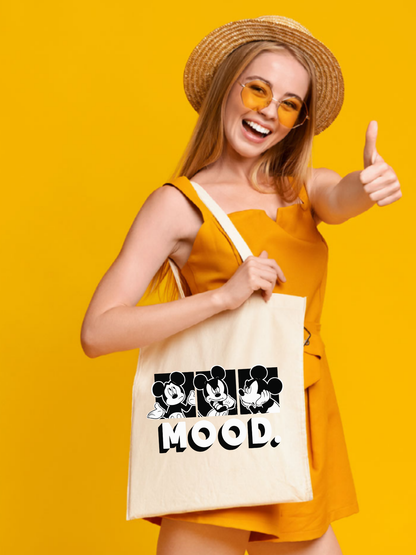 Mickey Mood tasarımlı %100 pamuk ham bez çanta. 35x40 cm dayanıklı, çevre dostu, günlük kullanım ve hediye için ideal tote bag modeli.
