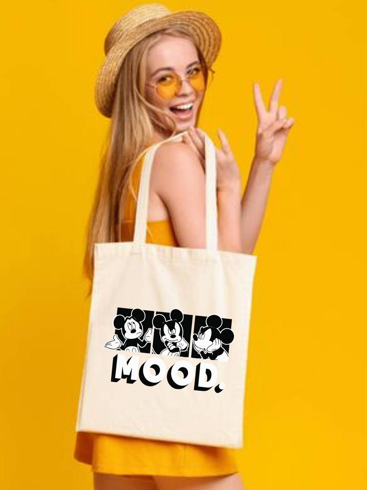 Mickey Mood tasarımlı %100 pamuk ham bez çanta. 35x40 cm dayanıklı, çevre dostu, günlük kullanım ve hediye için ideal tote bag modeli.